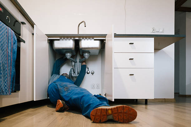 Professional Drain Cleaning technician working in Reading, MI